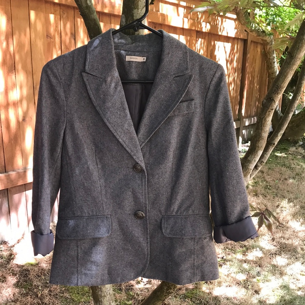 Grey blazer.
